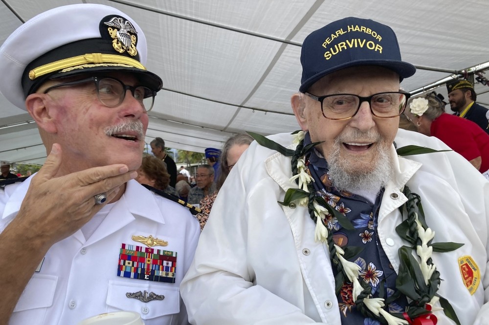 Survivor's Return: Honoring Lost Comrades on Pearl Harbor Day